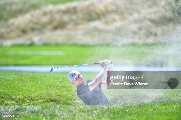 Laurie CANTER of England hits out of a bunker during the HNA French Open on June 28, 2018 in Saint-Quentin-en-Yvelines, France.