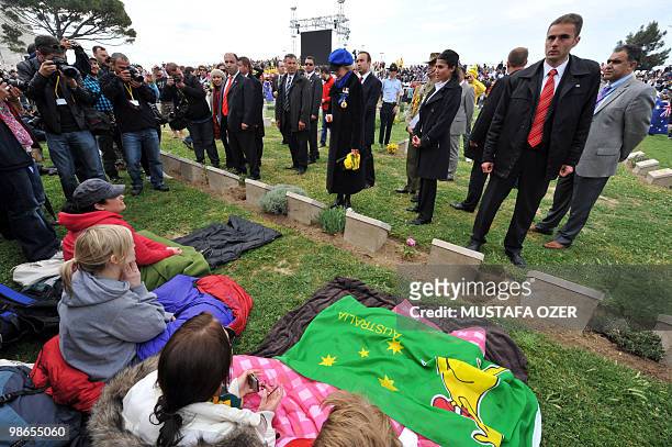 Australian Governor General Quentin Bryce stands by a grave at the Lone Pine cemetary during a ceremony commemorating Anzac Day, at Anzac Cove, in...