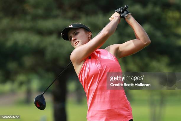Lexi Thompson hits her tee shot on the fifth hole during the first round of the KPMG Women's PGA Championship at Kemper Lakes Golf Club on June 28,...