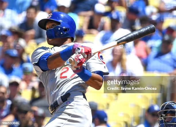 Addison Russell of the Chicago Cubs hits a two run home run in the seventh inning of the game against the Los Angeles Dodgers at Dodger Stadium on...