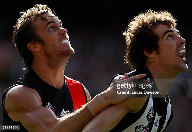 Steele Sidebottom of the Magpies contests for a mark against Andrew Welsh of the Bombers during the round five AFL match between the Collingwood...