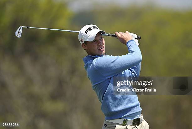 Danny Willett of England tees off on the 14th hole during the Round Three of the Ballantine's Championship at Pinx Golf Club on April 25, 2010 in...