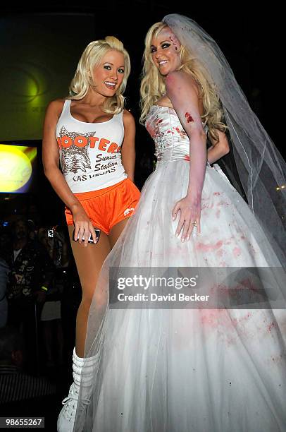 Television personalities Holly Madison and Bridget Marquardt, both dressed in costumes attend the Halfway to Halloween party at the Eve nightclub at...