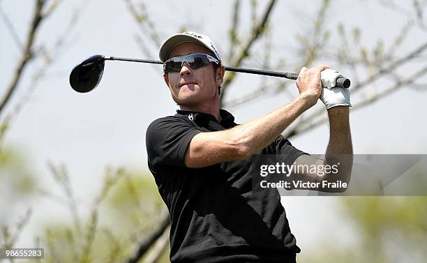 Brett Rumford of Australia tees off on the 12th hole during the Round Three of the Ballantine's Championship at Pinx Golf Club on April 25, 2010 in...