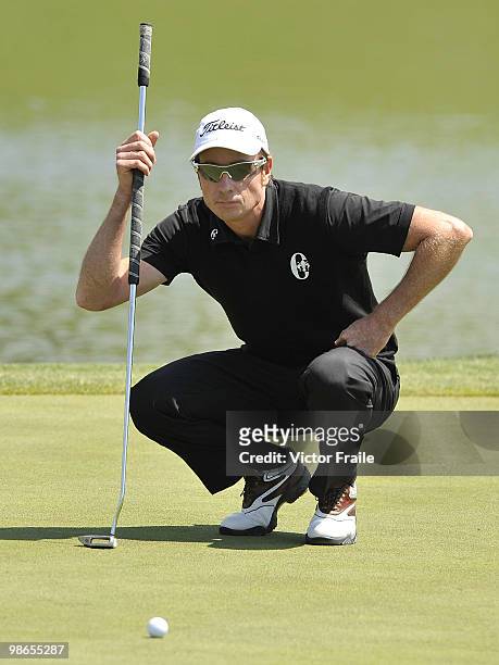 Brett Rumford of Australia lines up a putt on the 2nd green during the Round Three of the Ballantine's Championship at Pinx Golf Club on April 25,...
