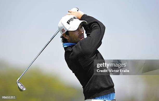 Gareth Maybin of Northern Ireland tees off on the 14th hole during the Round Three of the Ballantine's Championship at Pinx Golf Club on April 25,...