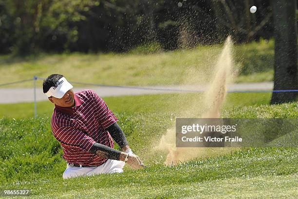 Mardan Mamat of Singapore plays a bunker shot on the 13th hole during the Round Three of the Ballantine's Championship at Pinx Golf Club on April 25,...