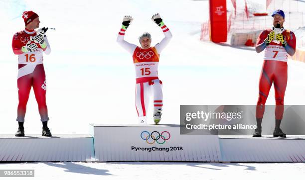 Beat Feuz of Switzerland, Matthias Mayer of Austria and Kjetil Jansrud of Norway at the award ceremony after the men's Super G alpine skiing event...