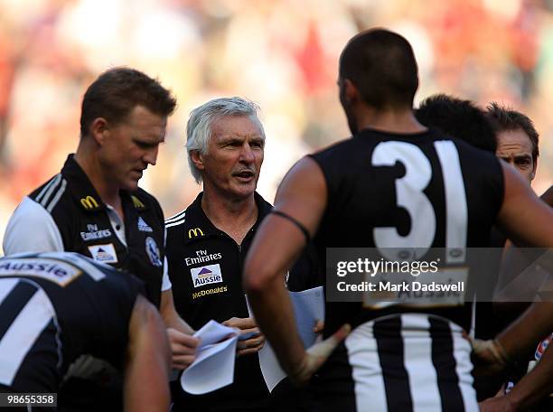 Michael Malthouse, coach of the Magpies, addresses his players during the round five AFL match between the Collingwood Magpies and the Essendon...