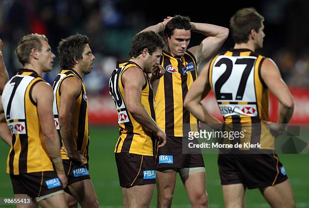 Hawks players after losing the game during the round five AFL match between the Hawthorn Hawks and the North Melbourne Kangaroos at Aurora Stadium on...