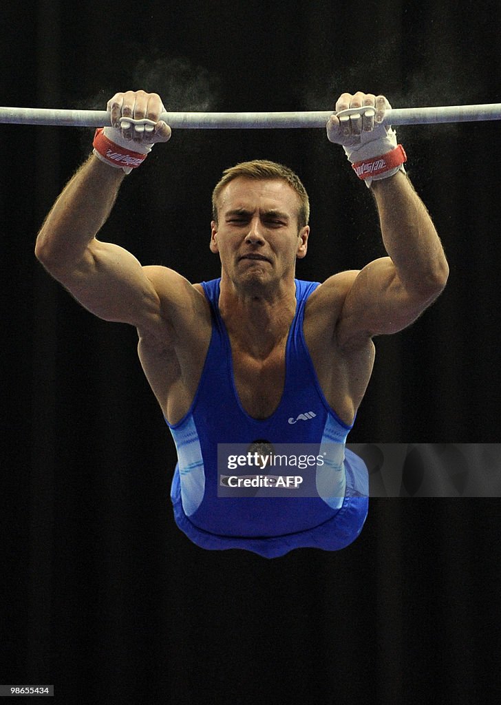 Romania's Ovidiu Buidoso performs on the