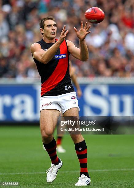 Jobe Watson of the Bombers gathers the ball during the round five AFL match between the Collingwood Magpies and the Essendon Bombers at Melbourne...