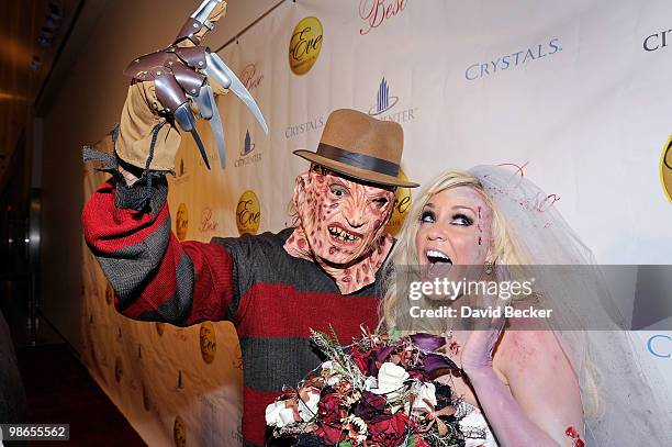 Television personality Bridget Marquardt, and a Freddy Krueger look-a-like, arrives at the Halfway to Halloween Party at the Eve nightclub at...