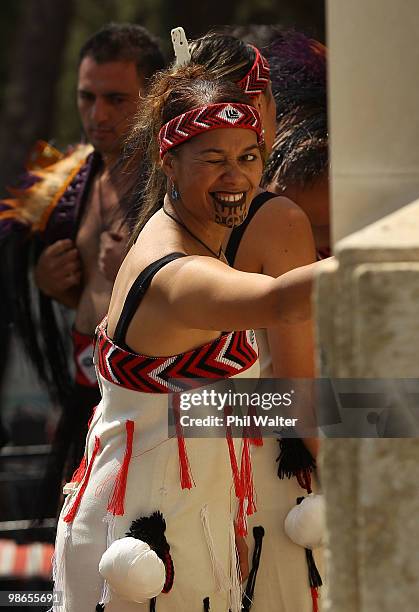 Members of the New Zealand Defence Force Maori Cultural Group place poppies on the memorial at the New Zealand Commemorative Service at Chunuk Bair...