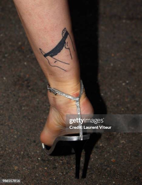 Model Sylvie Ortega Munos, tattoo detail, attends "Trophee de la Petanque Gastronomique" at Paris Yacht Marina on June 28, 2018 in Paris, France.