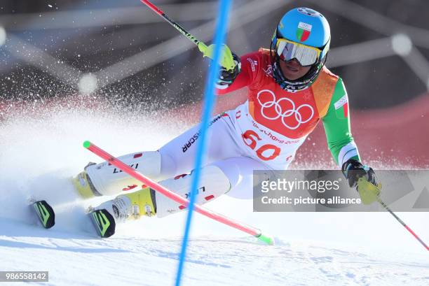Mialitiana Clerc of Madagaskar in the 1st heat of the women's Slalom alpine skiing event during the Pyeongchang 2018 winter olympics in Yongpyong,...