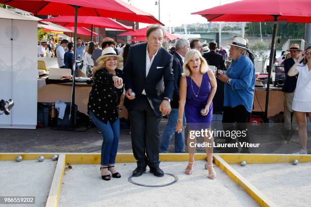 Singer Nicoletta, Journalist Daniel Auclair and Actress Elisa Servier attend "Trophee de la Petanque Gastronomique" at Paris Yacht Marina on June 28,...