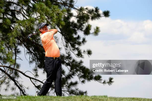 Jerry Kelly makes a tee shot on the fifth hole during round one of the U.S. Senior Open Championship at The Broadmoor Golf Club on June 28, 2018 in...