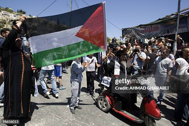 Member of Neturei Karta, a fringe of ultra-Orthodox movement within the anti-Zionist bloc in Israel, join Palestinians in a protest in the Arab east...