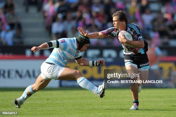 Stade Francais' fullback Hugo Bonneval vies with Metro Racing 92's hooker Benjamin Noirot during their French Top 14 rugby union match at the...