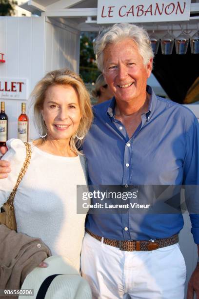 Presenter Pierre Dhostel and his wife Carole Bellemare attend "Trophee de la Petanque Gastronomique" at Paris Yacht Marina on June 28, 2018 in Paris,...