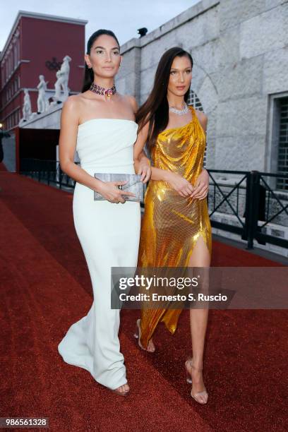 Lily Aldridge and Bella Hadid attend BVLGARI Dinner & Party at Stadio dei Marmi on June 28, 2018 in Rome, Italy.