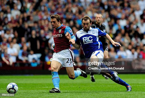 Stephen Warnock of Aston Villa battles with James McFadden of Birmingham City during the Barclays Premiership match between Aston Villa and...
