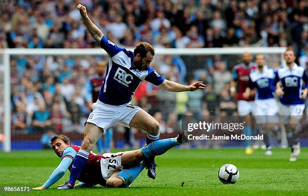 Stephen Warnock of Aston Villa battles with James McFadden of Birmingham City during the Barclays Premiership match between Aston Villa and...