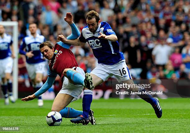 Stephen Warnock of Aston Villa battles with James McFadden of Birmingham City during the Barclays Premiership match between Aston Villa and...