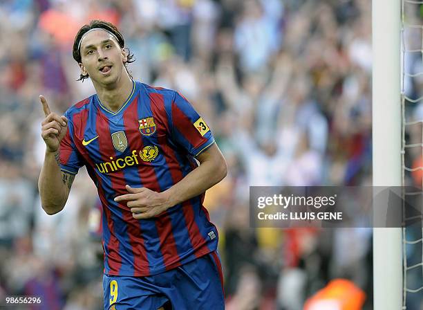 Barcelona's Swedish forward Zlatan Ibrahimovic celebrates after scoring a goal during the Spanish League football match between Barcelona and Jerez...