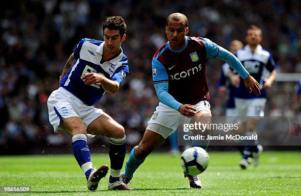 Gabriel Agbonlahor of Aston Villa battles with Liam Ridgewell of Birmingham City during the Barclays Premiership match between Aston Vilaa and...