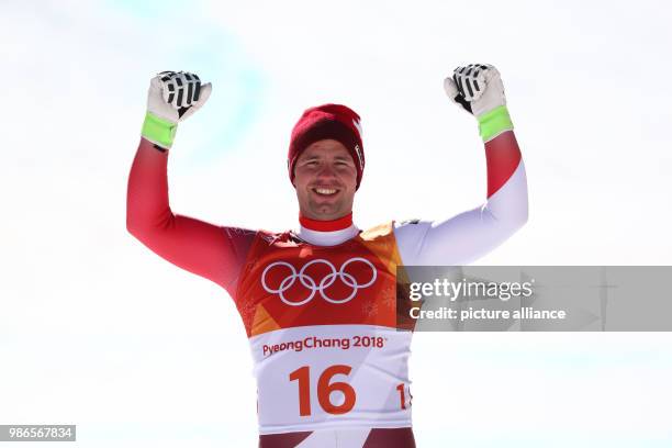 Beat Feuz of Switzerland during the award ceremony after the men's Super G alpine skiing event during the Pyeongchang 2018 winter olympics in...