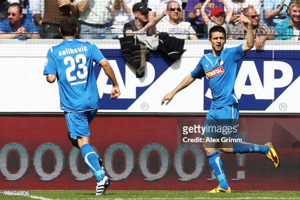Vedad Ibisevic of Hoffenheim celebrates his team's first goal with team mate Sejad Salihovic during the Bundesliga match between 1899 Hoffenheim and...