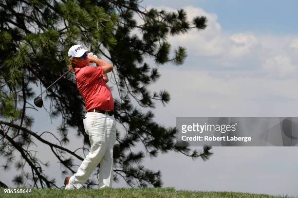 Miguel Angel Jimenez of Spain makes a tee shot on the sixth hole during round one of the U.S. Senior Open Championship at The Broadmoor Golf Club on...