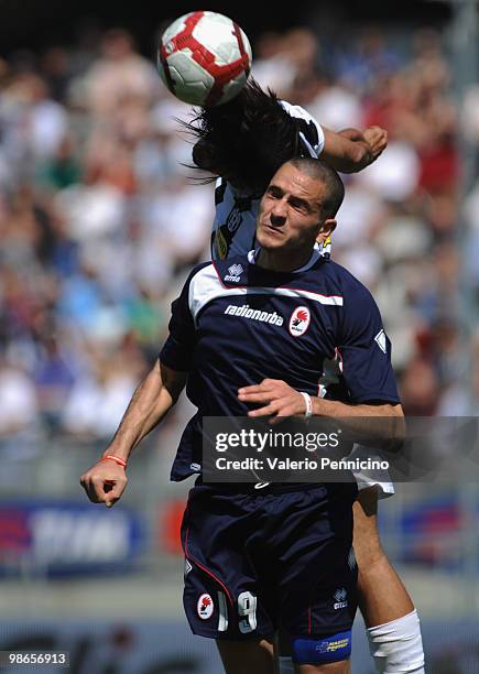 Carvalho De Oliveira Amauri of Juventus FC clashes with Leonardo Bonucci of AS Bari during the Serie A match between Juventus FC and AS Bari at...