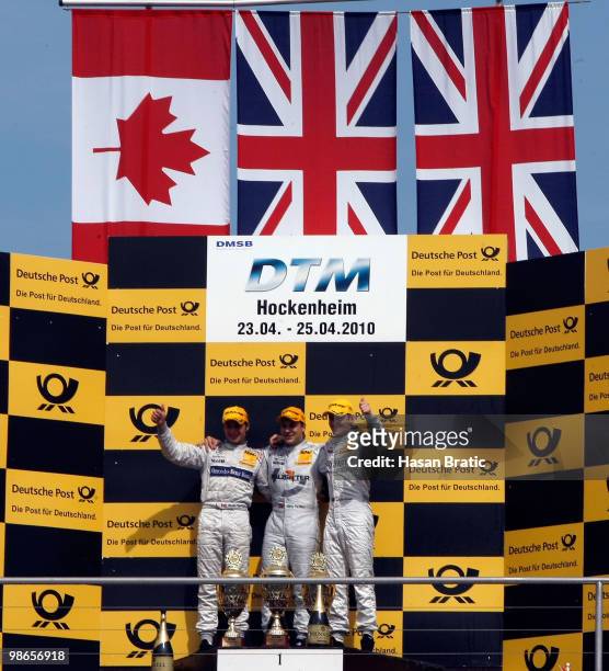 Bruno Spengler of Canada finishing 2nd position, Gary Paffet of Great Britain finishing 1st position and Jamie Green of Great Britain finishing 3rd...