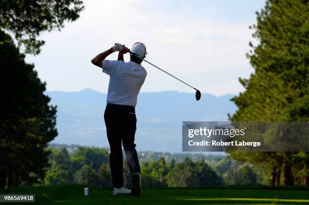 Stephen Ames of Canada makes a tee shot on the third hole during round one of the U.S. Senior Open Championship at The Broadmoor Golf Club on June...