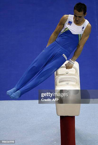 Slovenia's Saso Bertoncelj performs on the pommel horse during the men seniors apparatus final, in the European Artistic Gymnastics Championships...