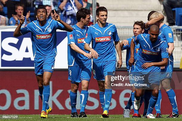 Vedad Ibisevic of Hoffenheim celebrates his team's second goal with team mates during the Bundesliga match between 1899 Hoffenheim and Hamburger SV...