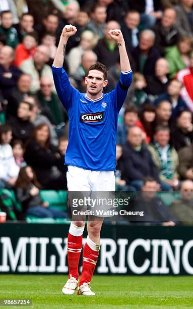 Rangers striker Kyle Lafferty celebrates his opening goal during the Clydesdale Bank Scottish Premier League match between Hibernian and Rangers at...