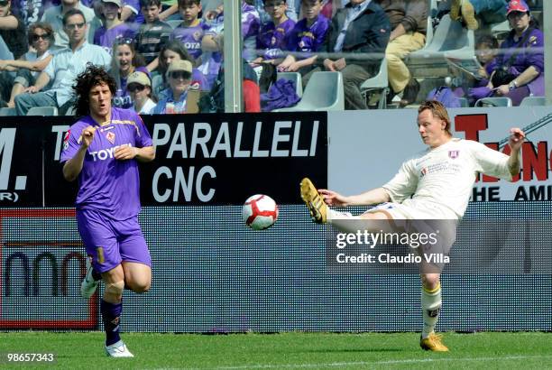 Stevan Jovetic of ACF Fiorentina competes for the ball with Nicolas Frey of AC Chievo Verona during the Serie A match between ACF Fiorentina and AC...