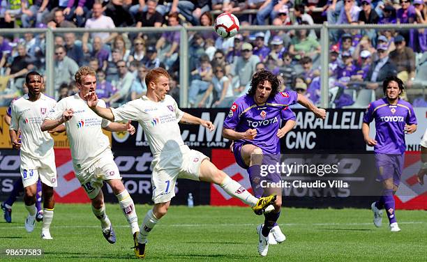 Stevan Jovetic of ACF Fiorentina competes for the ball with Michele Marcolini of AC Chievo Verona during the Serie A match between ACF Fiorentina and...