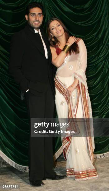 Husband-wife actor duo Abhishek Bachchan and Aishwarya Rai pose during the launch of Bollywood movie 'Raavan' , in Mumbai on Saturday April 24, 2010