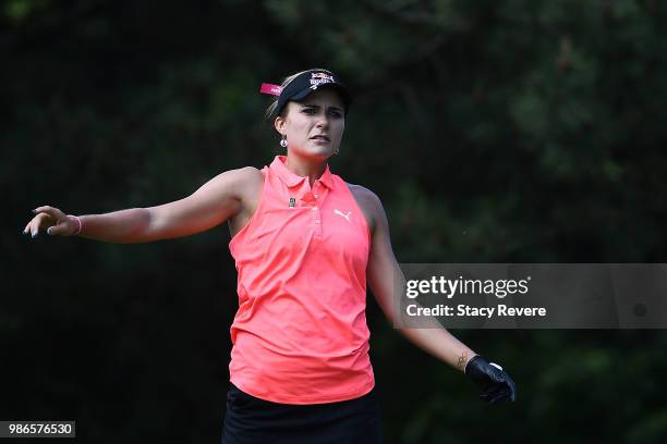 Lexi Thompson reacts to her tee shot on the second hole during the first round of the KPMG Women's PGA Championship at Kemper Lakes Golf Club on June...