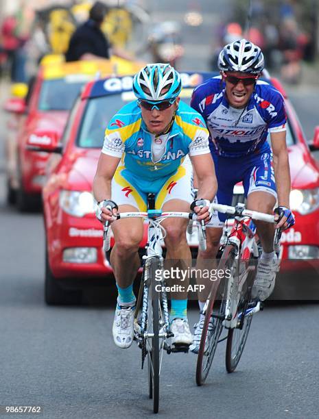 Russian Aleksandr Kolobnev of team Katusha and Kazakhstan's Alexander Vinokourov of team Astana pedal during the 96th cycling race...