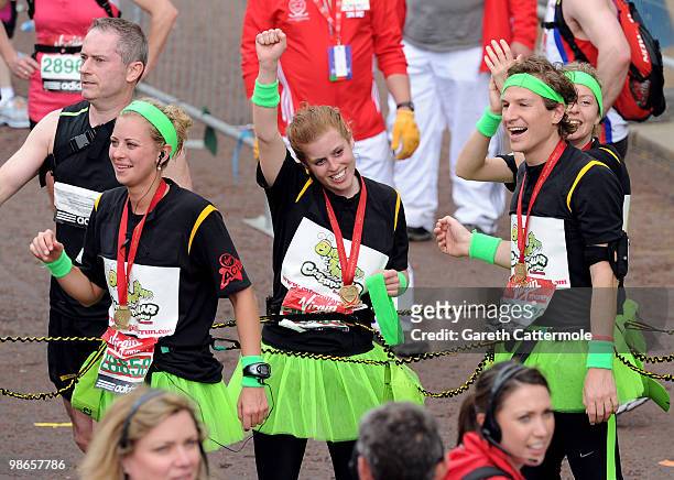 Holly Branson, Princess Beatrice and Dave Clark finish the Virgin London Marathon on April 25, 2010 in London, England. Princess Beatrice is...
