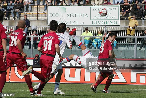 Maximiliano Lopez of Catania Calcio scores their first goal during the Serie A match between AS Livorno Calcio and Catania Calcio at Stadio Armando...