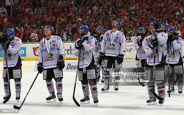 Players of Augsburg look dejected after losing the DEL play off final match between Hannover Scorpions and Augsburger Panther at TUI Arena on April...