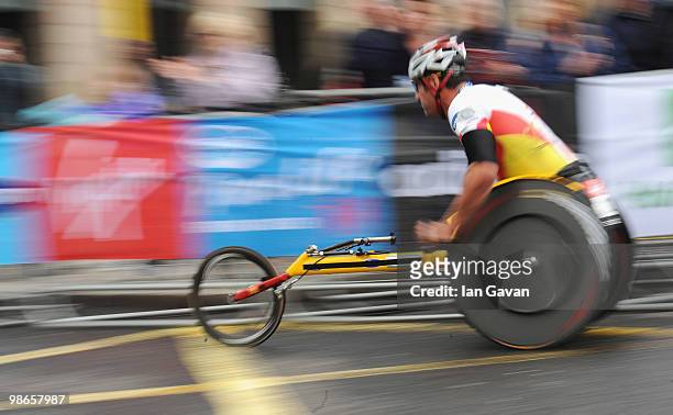 Elite Wheelchair athlete Ernst Van Dyk from the South Africa goes through Parliament Square in Westminster during the 2010 Virgin London Marathon on...