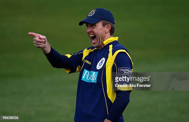 Hampshire fielder Dominick Cork shares a joke with a spectator during the Clydesdale Bank 40 match between Durham Dynamos and Hampshire Royals at The...